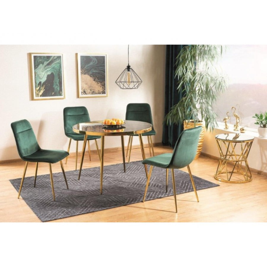 Okrogla jedilna miza KELVIN je elegantna in minimalistična. Narejena je iz kovine in navdušuje z učinkom marmorja na mizni plošči. Dimenzije: - Fi100 x V: