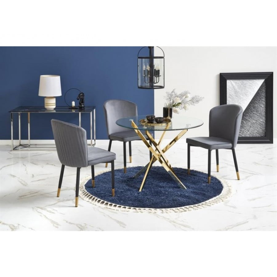 Okrogla miza RAMONDO2 je atraktivna in sodobna miza iz stekla. Podnožje je iz kvalitetne kovine v zlati barvi. Dimenzije: - Fi100 x V: 73 cm Material: -