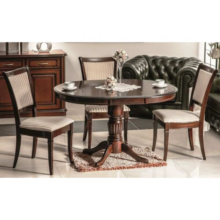 Klasična jedilna miza z rustikalnim izgledom. Miza je raztegljiva. Je kvalitetna in stabilna miza. Barva: -oreh Dimenzije: -90(125) x 90 x 75cm Materijal: