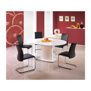 Raztegljiva jedilna miza RICO je kakovostna in elegantna. V raztegnjeni poziciji lahko za mizo sedi osem ali več oseb.