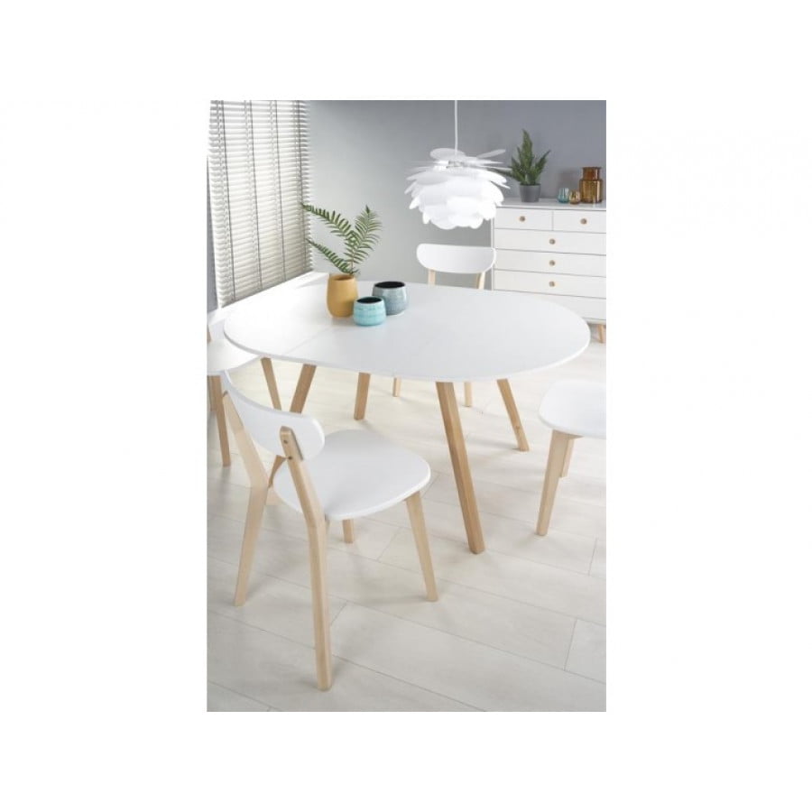 Raztegljiva miza RUBIN bela je kakovostna masivna jedilna miza, ki se lahko podaljša za 40 cm. Dimenzije: - D: 102/142 x G: 102 x V: 73 cm Material: - MDF