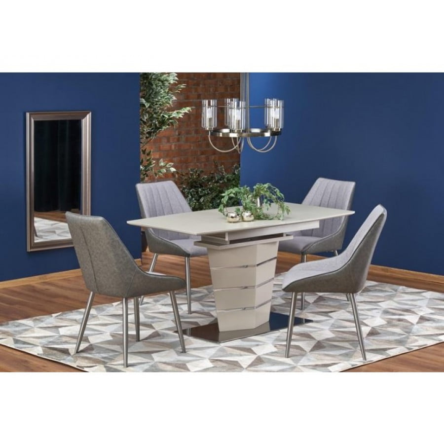 Raztegljiva miza SONTO je kakovostna miza iz kovine, stekla in MDF plošče. Sodobna in hkrati prefinjena oblika navdaja jedilni prostor z eleganco in