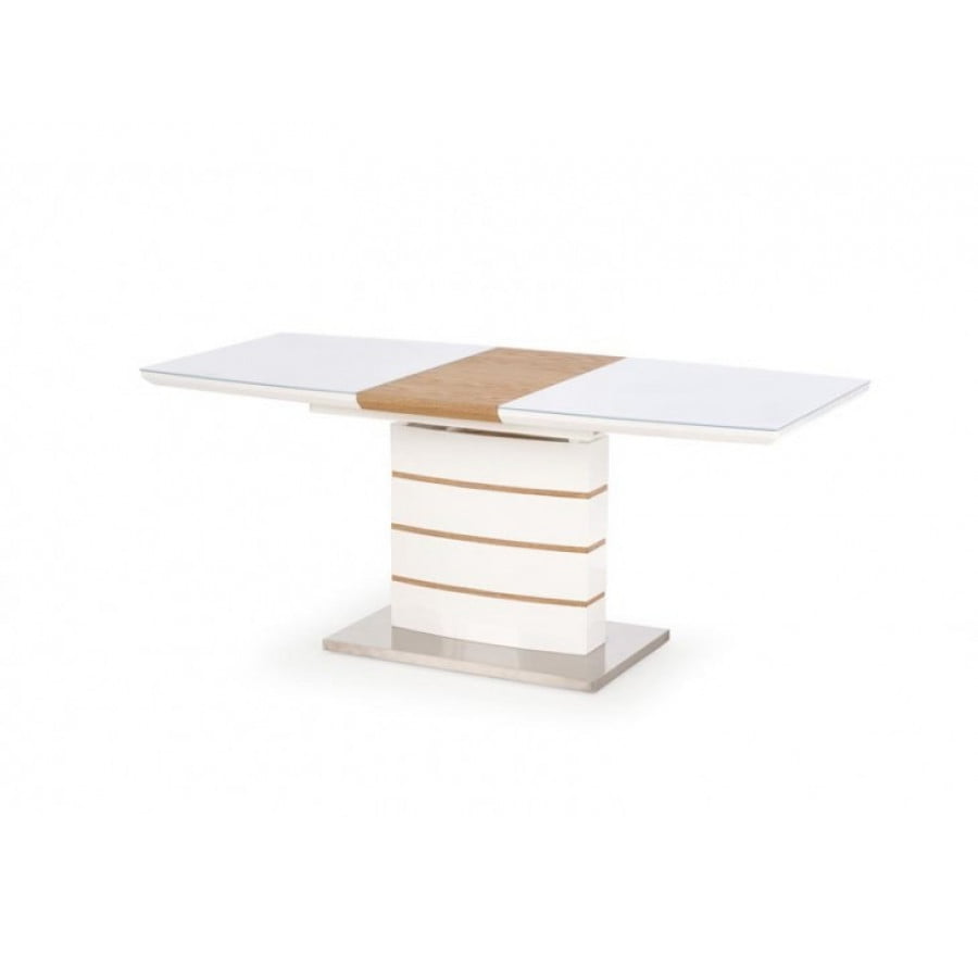 Raztegljiva miza TORO združuje modernost, urejenost in funkcionalnost pohištva. Narejena je iz kvalitetnih materialov in izžareva robustnost in eleganco v