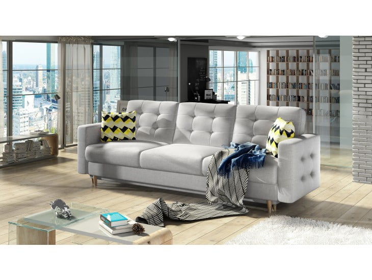 Sofa MIJA je sofa s stilom skandinavskega sloga. Dobavljiva v kvalitetnem blagu. Sofa ima pomožno ležišče in predal. Trosed je vzmeten in ima lesene