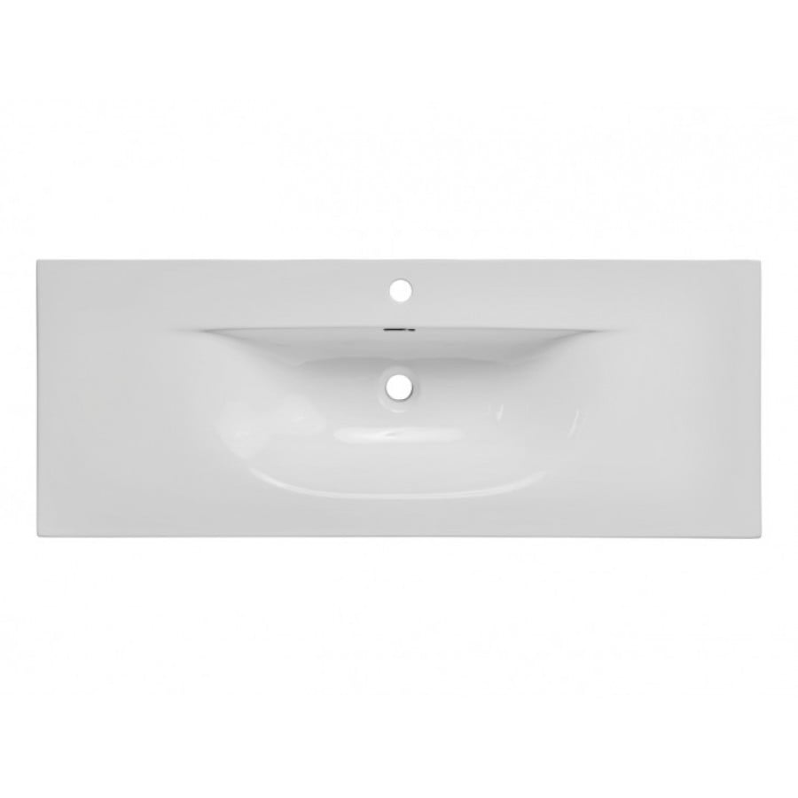 Vgradni kopalniški umivalnik SKI 120D je narejen iz bele keramike in se lepo poda v vsakršno kopalnico. Dimenzije: - D: 121 x G: 46 x V: 17 cm