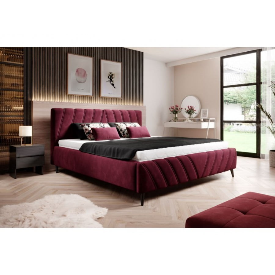 Moderno oblazinjena postelja LINA modernega dizajna vam bo popestrila vaš prostor. Dobavljiva je v treh dimenzijah. Postelja vsebuje letveno dno. Višina