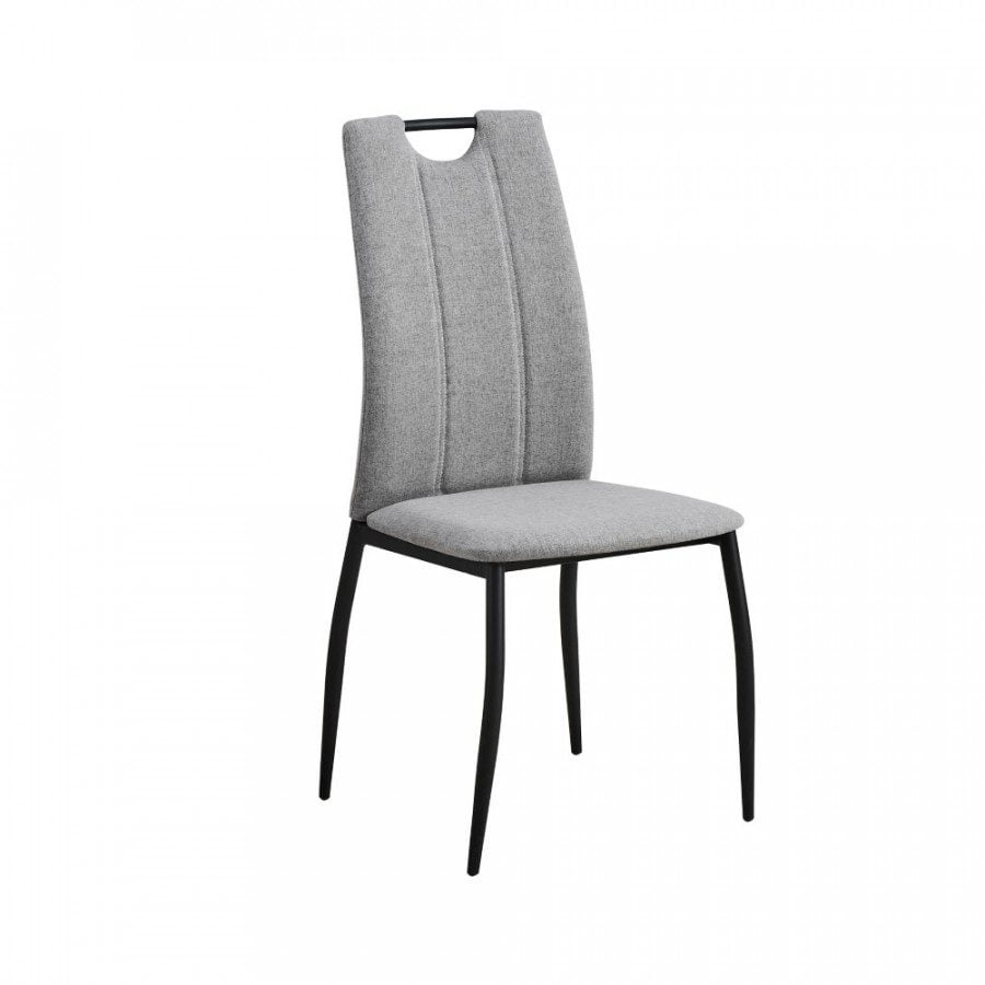 Preprost jedilniški stol, z ergonomičnim naslonjalom za hrbet. V celoti je oblazinjen s kvalitetno tkanino, na voljo v več odtenkih sive barve. 4 cm debel