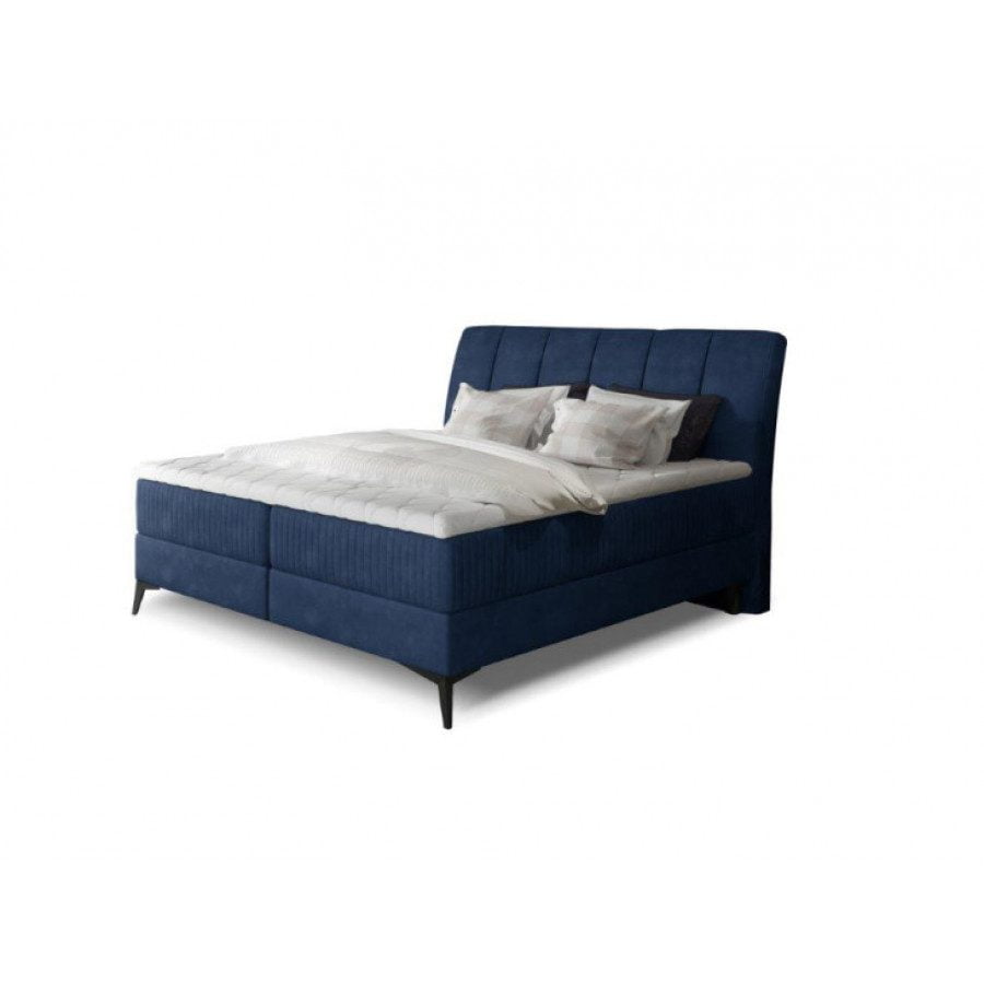 Francoska postelja ARITO je oblečena v visoko kakovostno tkanino. Čvrsta vzmetnica je nameščena na robustnem oblazinjenem okvirju, s prostorom za