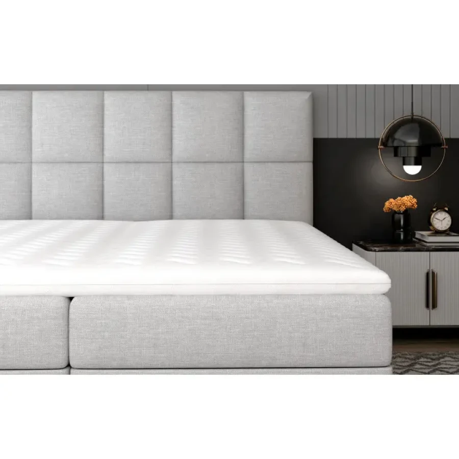 Francoska postelja GLOS se ponaša s preprosto a prefinjeno obliko. Visoka vzmetnica omogoča lažje vstajanje. Boxspring postelja je sestavljena iz velike