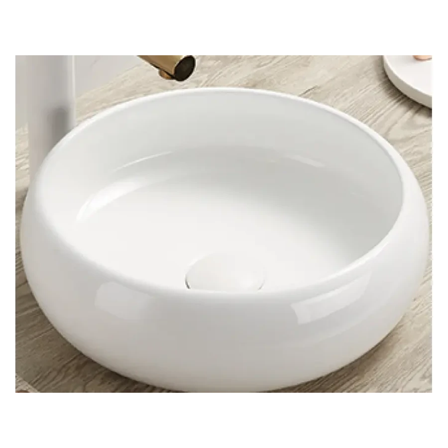 Nadpultni kopalniški umivalnik JAGODA 30 je trpežen umivalnik sodobnih linij. Narejen je iz keramike v beli barvi in se lepo poda v vsakršno kopalnico.