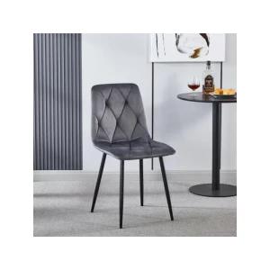 Jedilni stol MILA velvet siva je odlična rešitev za kombiniranje v minimalističen ali industrijski stil prostora. Kombinacija sivega prešitega blaga s