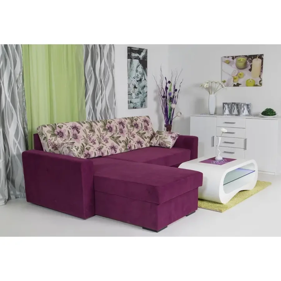 Kotna sedežna garnitura AMBROSIJA bo poživela vaš dnevni prostor s svojo živahno barvo in rožastim vzorcem blazin. Je raztegljiva, tako da vam lahko