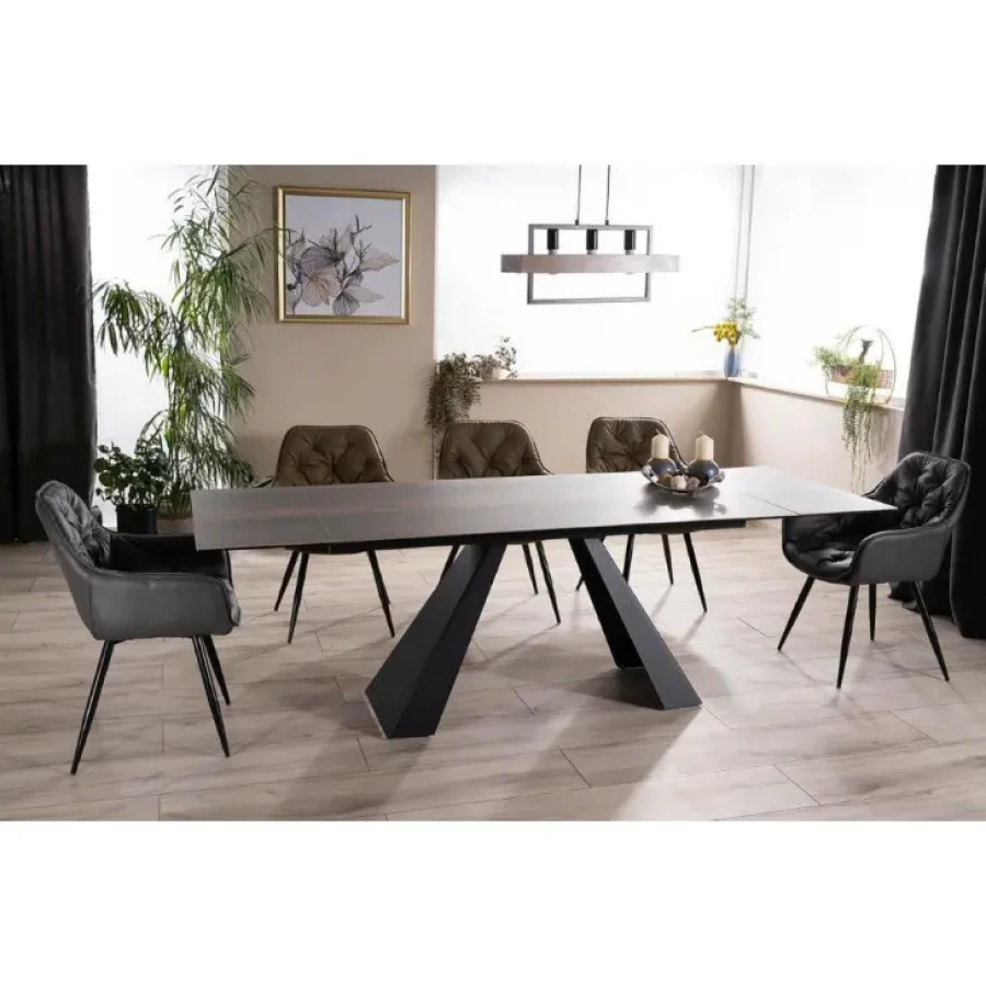 Moderna raztegljiva jedilna miza SALVADOR 2 predstavlja praktičnost in sodobni pristop k ureditvi jedilnega prostora. Mizna plošča je narejena iz kaljenega
