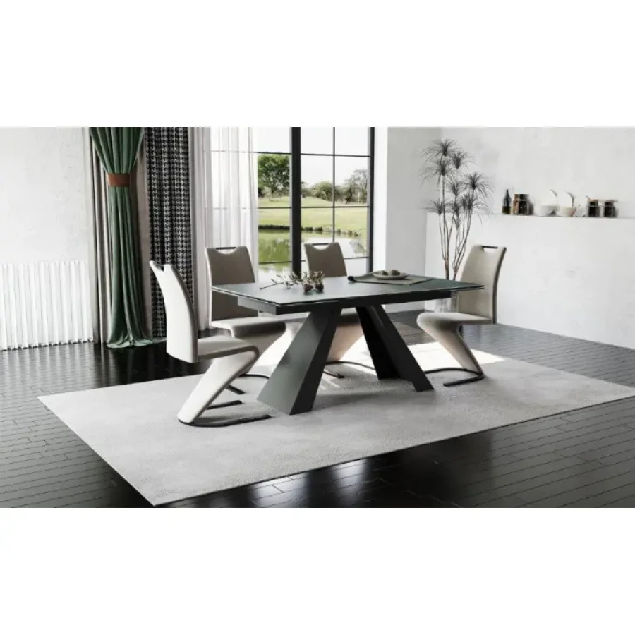 Moderna raztegljiva jedilna miza SALVADOR 4 predstavlja praktičnost in sodobni pristop k ureditvi jedilnega prostora. Mizna plošča je narejena iz kaljenega