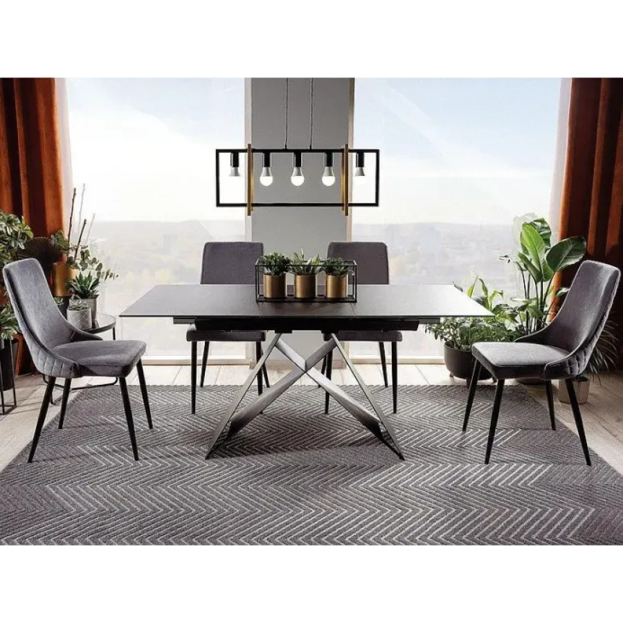 Moderna raztegljiva jedilna miza TINE 1. Dobavljiva v črni mat barvi z učinkom marmorja. Mizna plošča je napravljena iz kaljenega stekla. Podnožje mizne