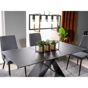 Moderna raztegljiva jedilna miza TINE 1. Dobavljiva v črni mat barvi z učinkom marmorja. Mizna plošča je napravljena iz kaljenega stekla. Podnožje mizne
