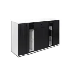 Dnevni regal SAMKI 6 . Dnevni regal SAMKI 6 je narejen iz kvalitetne laminirane plošče debeline 15 mm. Ima melaminski obrob ter plastične ročaje. Vsebuje