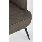 Fotelj ERNESTINE, je eleganten kos pohištva, ki je primeren za vsak prostor. Okvir je narejen iz borovega lesa in MDF-ja. Noge so narejene iz kovine. Prevleka