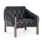 Fotelj HARRISON črna . Fotelj HARRISON je dobavljiv v črni barvi. Okvir je narejen iz lesa, kar zagotavlja dodatno stabilnost in eleganco. Prevleka je iz