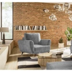 Fotelj MIKI . Fotelj MIKI je kombinacija udobja in preprostosti, podprta s sodobnim pridihom. Miki ima brezčasen dizajn in visoke naslone za roke z nežnimi