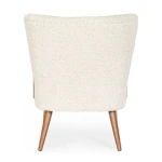 Fotelj MORITZ bela . Fotelj MORITZ bel je narejen iz lesa ter prevleko iz poliestra ki daja učinek volne. Na dotik je prijeten in mehek. Material: - Les -