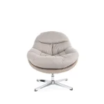 Fotelj PEGA . Fotelj PEGA, je eleganten in kakovosten kos pohištva. Narejen je iz blaga. Ima mehko in udobno sedišče ter možnost vrtenja za 360 stopinj.