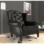 Fotelj ROSALIA . Zagotovite si počitek na udobnem fotelju ROSALIA. Nogice so lesene, za dodatno udobje pa poskrbi vzmetenje. Fotelj, ki bo vnesel svežino v