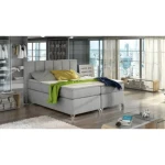 Francoska postelja BAS 1 140X200 . Francoska postelja BAS je oblečena v visoko kakovostno tkanino. Čvrsta vzmetnica je nameščena na robustnem oblazinjenem