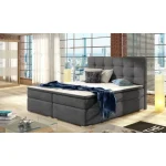 Francoska postelja INES 160X200 . Francoska postelja INES je sestavljena iz visoke vzmetnice in velikega oblazinjenega okvirja. Ležišče je narejeno iz