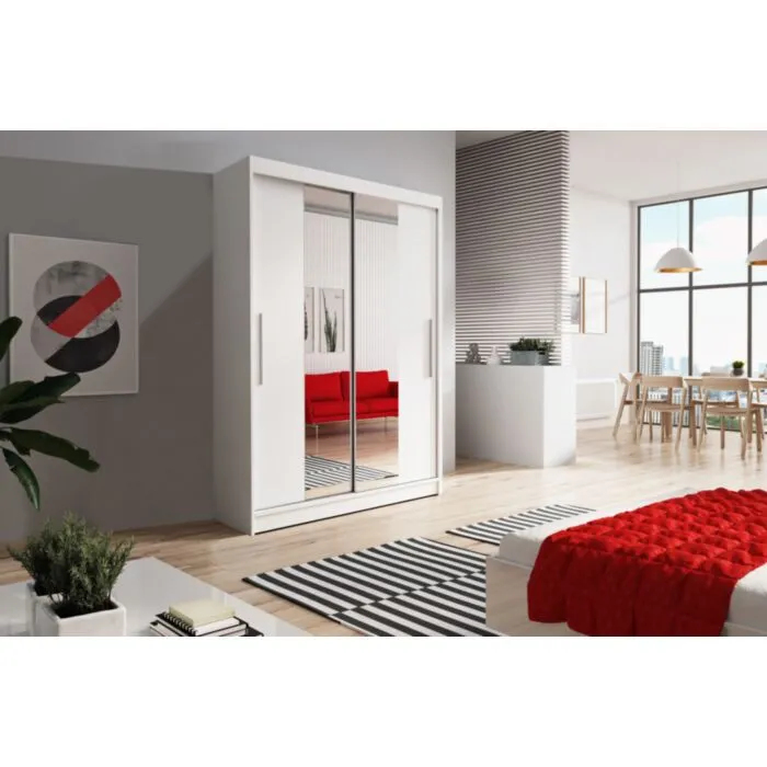 Garderobna omara OMEGA Garderobna omara OMEGA . Garderobna omara OMEGA je primerna za vse spalnice. Je zelo prostorna. Na levi strani ima zelo prostorne police, na desni strani pa je