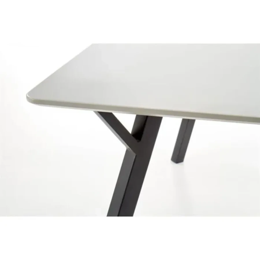 Jedilna miza GRAL . Jedilna miza GRAL je sodobnega in gladkega videza. Dimenzije: - D: 140 x G: 80 x V: 74 cm Material: - MDF / kovina Barve: - Siva / črna