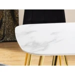 Jedilna miza IZABELA . Jedilna miza IZABELA je privlačna, elegantna in uporabna. Izgled marmorja ustvarja skupaj z zlatimi nogicami občutek razkošja v