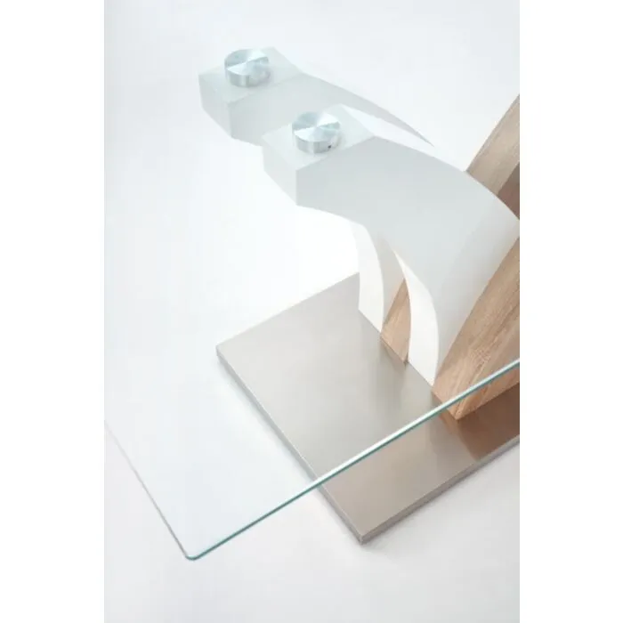 Jedilna miza VILMA Jedilna miza VILMA . Miza VILMA je izdelana po trendu oblikovalcev pohištva, ki združujejo robustnost kovine s toplino lesa. Nežne oblike mize privlačijo