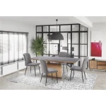 Jedilna raztegljiva miza KONRAD . Moderna miza KONRAD je dobavljiva v barvi zlatega hrasta, plošča mize in podnožje pa sta v temno sivi barvi. . Mizna