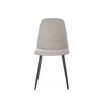 Jedilni stol AUGUST . Jedilni stol AUGUST ima sedalni del iz tkanine, kateri s svojimi linijami daje moderni videz. Nogice so iz kovine v črni mat barvi.