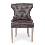 Jedilni stol AZELIA rjava . Jedilni stol AZELIA rjava ima strukturo iz lesa, sedež in naslon pa sta oblečena v tkanino (40% poliester, 30% bombaž ter 30%