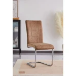 Jedilni stol DANA 2 oker . Jedilni stol DANA 2 je elegantne oblike in kakovostne izdelave. Njegov dizajn se bo podal v vsako jedilnico. Oblazinjen je v oker