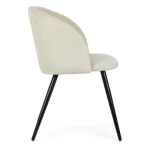 Jedilni stol QUEEN bela modernega dizajna, bo polepšal vsak prostor. Za večje udobje je stol oblazinjen z poliuretansko peno, ki je oblečena v mehko