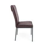 Jedilni stol SOFI rjava . Jedilni stol SOFI rjava ima jekleno in vezano konstrukcijo.Polnilo je iz poliuretanske pene in oblečeno v rjavo umetno usnje. Noge