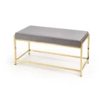 Klop Kira . Klop KIRA je zelo praktična in stabilna. Narejena je iz blaga v sivi barvi, noge pa so iz kromiranega jekla pobarvane v zlato barvo. Dimenzije: -