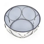 Klubska miza DALIJA . Klubska miza DALIJA z njeno elegantno in posebno obliko bo popestrila vse dnevne sobe. Mizna plošča je okrogla in narejena iz stekla.