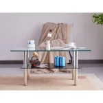 Moderna klubska mizica NAMI, je eleganten kos pohištva. Zgornja mizna plošča je narejena iz prozornega kaljenega stekla 8mm debeline. Spodnja mizna plošča