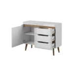 Komoda RON 107 . Elegantna komoda RON v skandinavskem slogu prinaša preprostost in svežino v vsak prostor. Na voljo je v kombinaciji bele mat in bele
