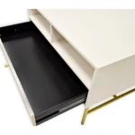 Komoda TOMI 1 . Komoda TOMI je prava izbira za sodobne in elegantne prostore. Narejena iz kakovostne laminirane plošče debeline 16 mm, zagotavlja trdnost in