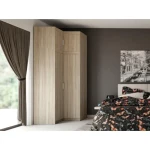 Kotna garderobna omara CINDY 2 . Kotna garderobna omara CINDY 2 je klasičnega videza zato je primerna za vsak prostor. Omara je zelo prostorna saj ima zgoraj