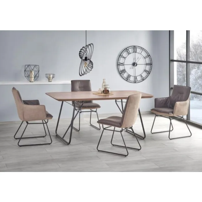 Kuhinjska jedilna miza STON . Moderna miza STON je dobavljiva v oreh barvi. Miza je kvalitetna ter stabilna in primerna za vsako kuhinjo. Barva: - oreh - črna