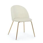 Kuhinjski stol TANYA bela . Kuhinjski stol TANYA je sestavljen iz kovinskih nog z zlatim kromiranjem, naslonjalo in sedež sta oblečena s poliuretansko peno,