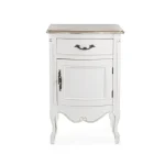 Nočna omarica 1A-1C JUSTINE . Nočna omarica JUSTINE, je eleganten kos pohištva, ki popestri vaš prostor. Narejena je iz pavlovnije s vrhom iz furnirja in