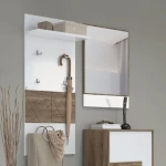 Ogledalo za predsobo VIŠNJA . Ogledalo VIŠNJA pravokotne oblike z lesenim okvirjem. Dobavljivo je v hrast / bela visoki sijaj barvi. Dimenzije: - Š: 63 cm x