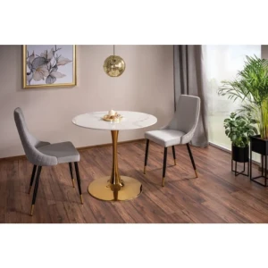 Okrogla jedilna miza RAKO . Okrogla jedilna miza RAKO je izdelana iz kvalitetnih materialov. Njen eleganti dizajn ter moderni videz se bo podal v vsak prostor.